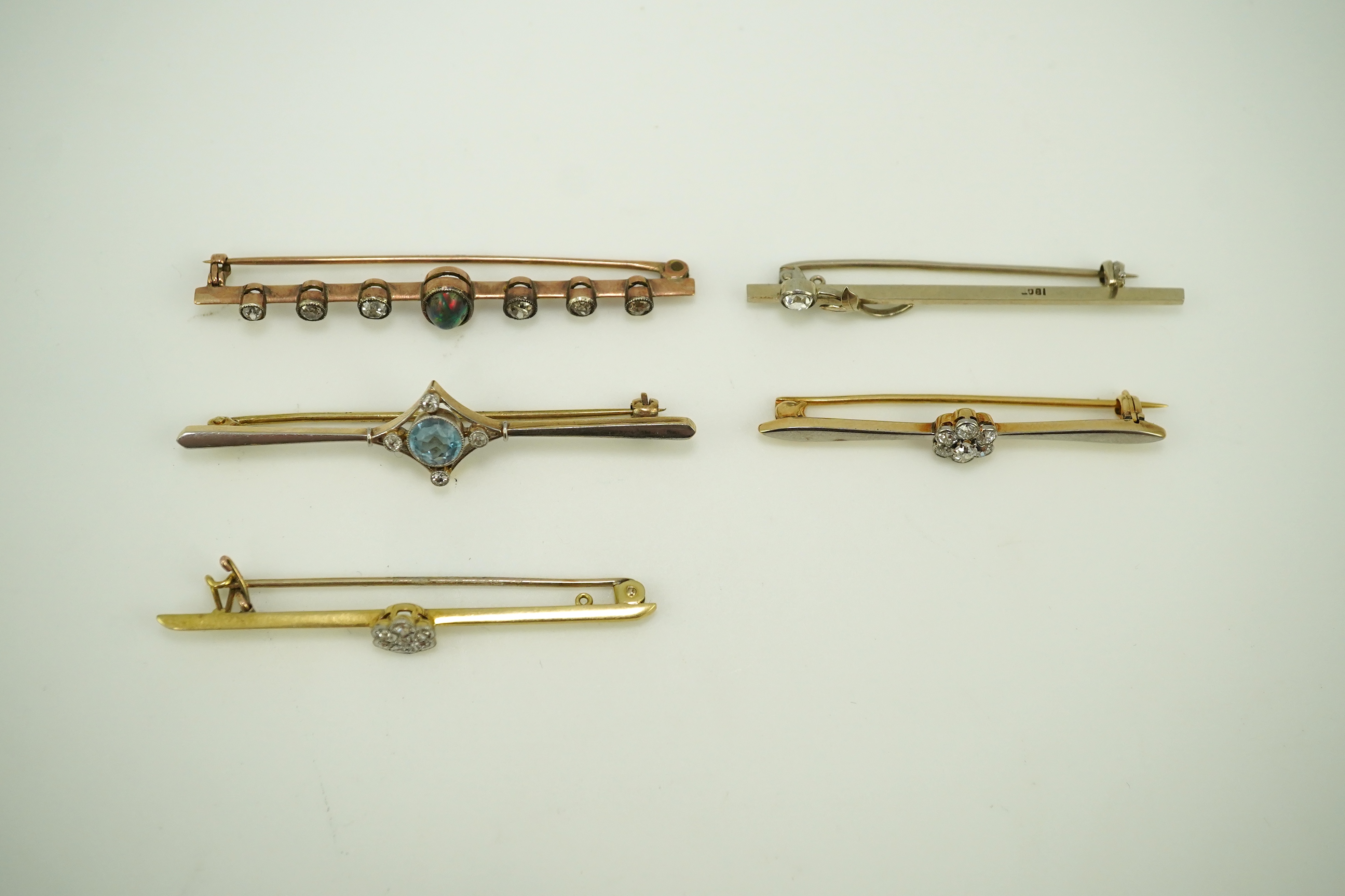 A collection of five gem-set brooches, early 20th century